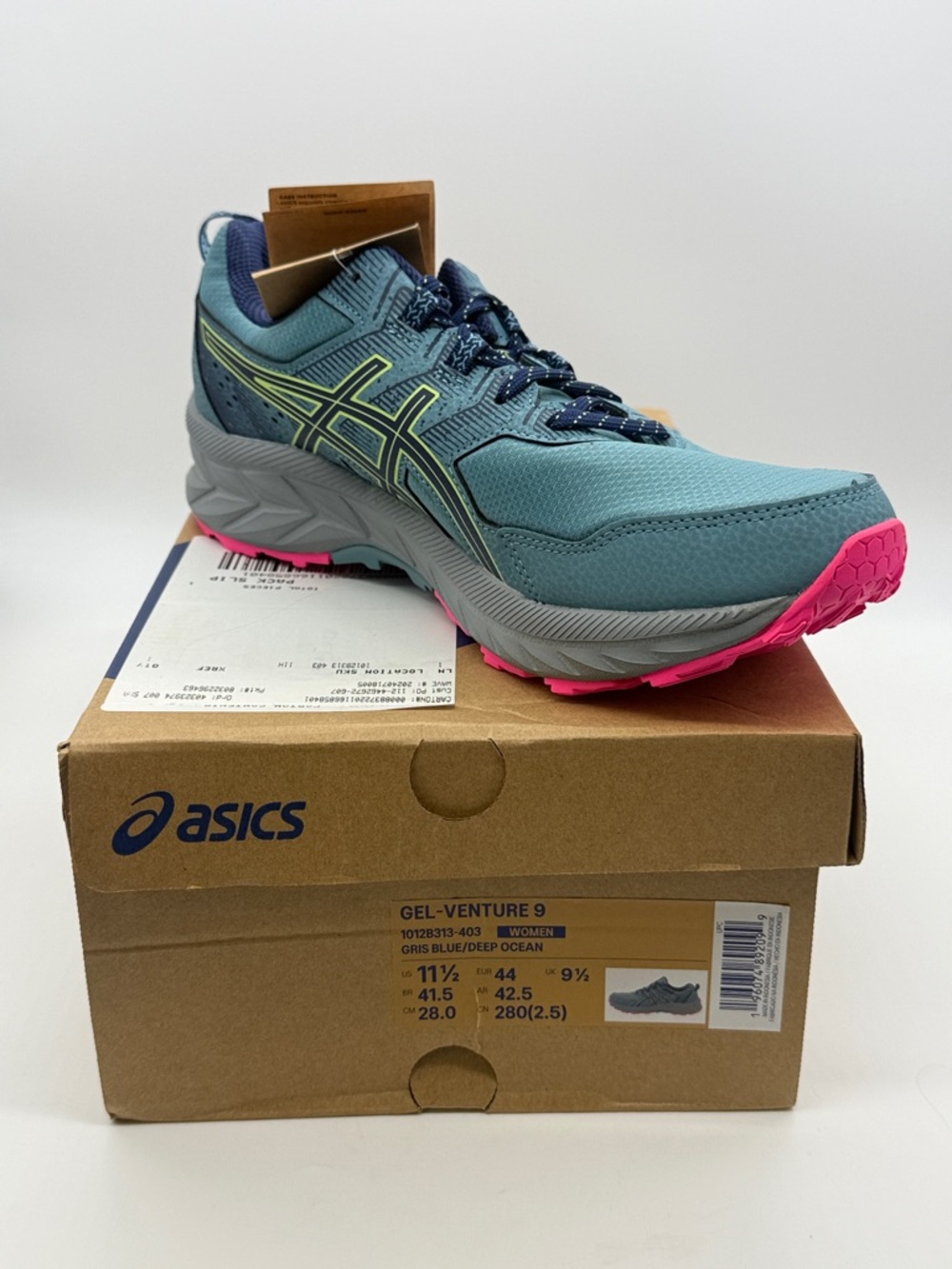 Asics Women's Trail Runner in Teal with Pink Accents